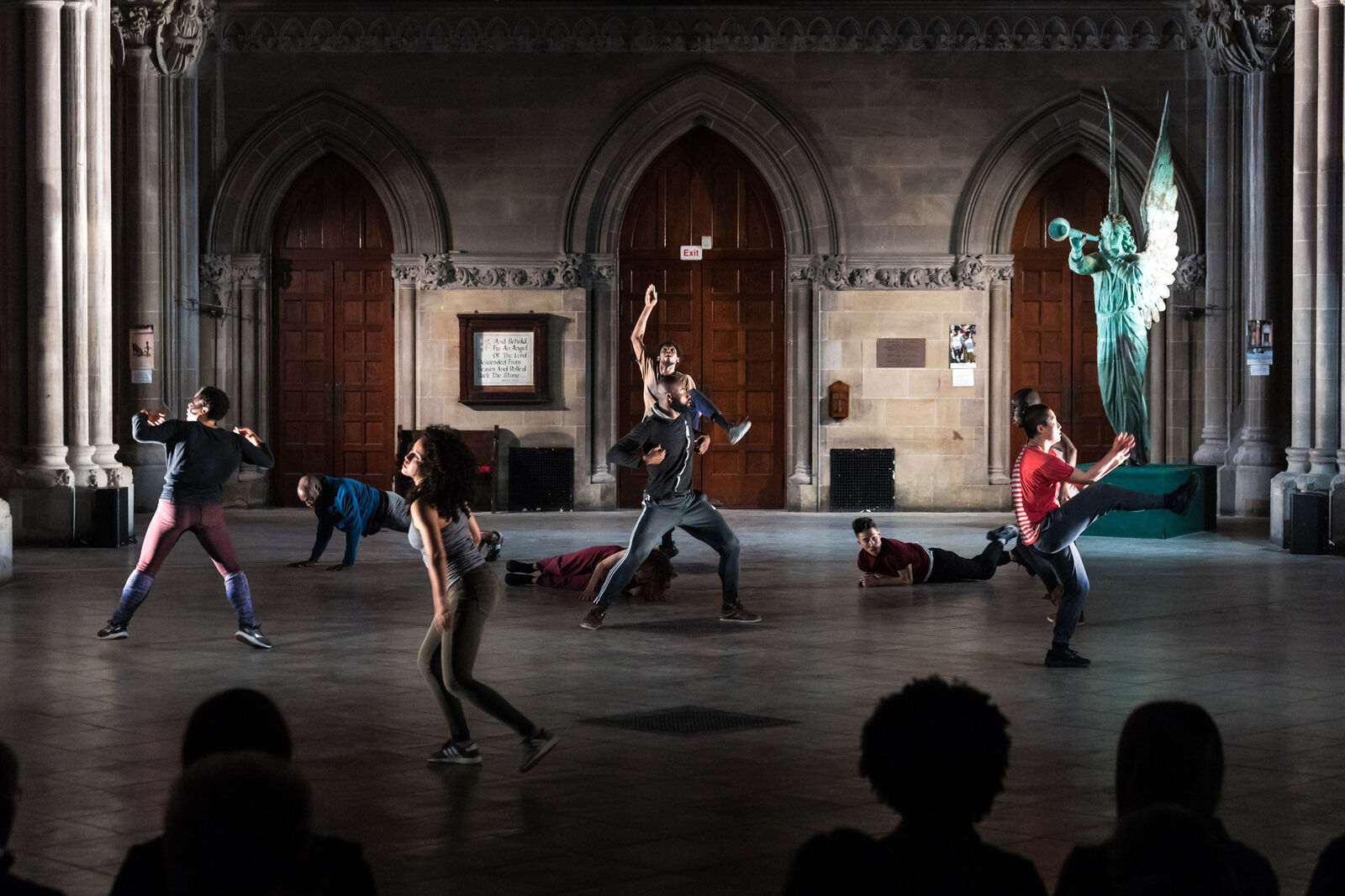 Individuals dancing in dance studio