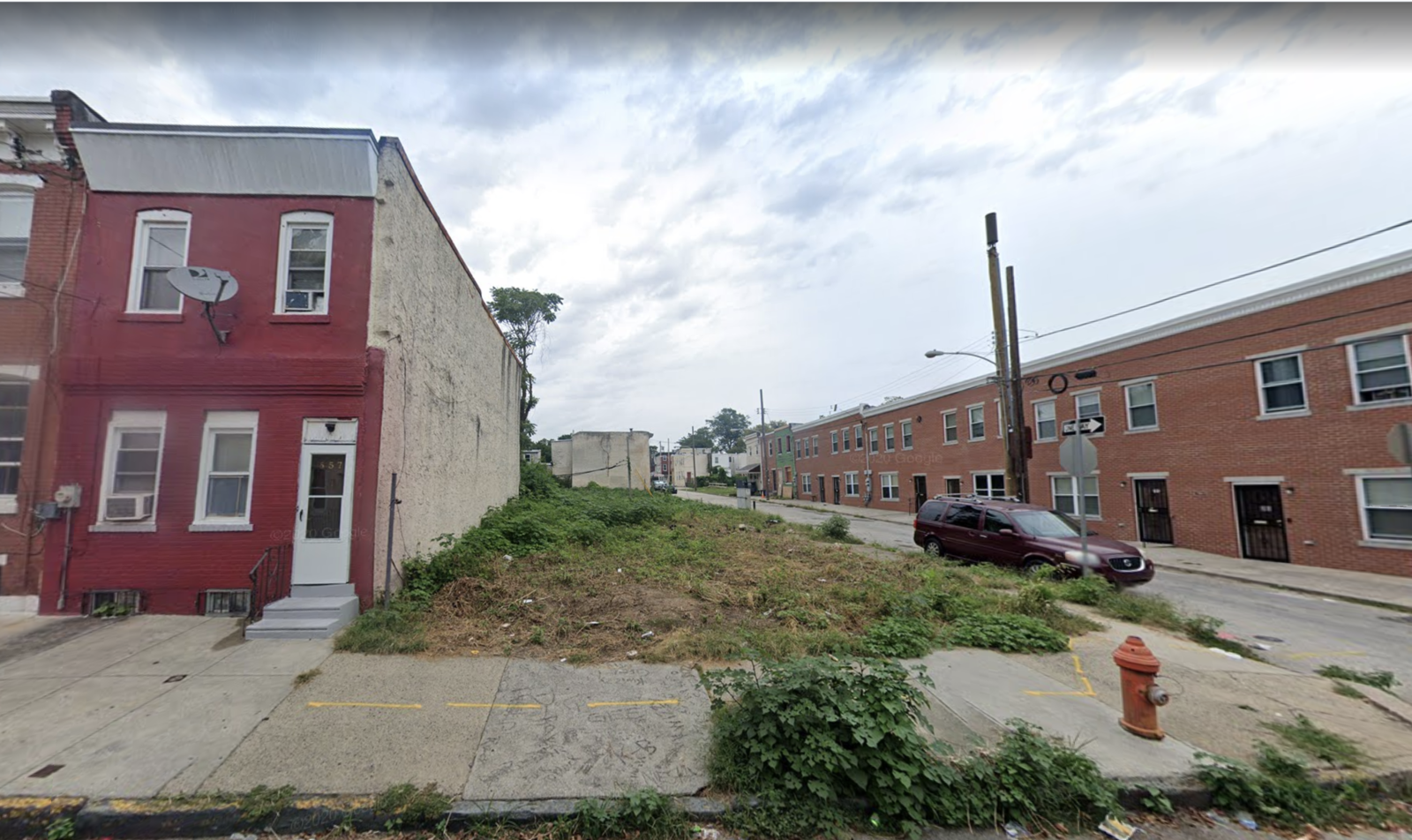 the melon st park before any development: an empty lot on a street corner