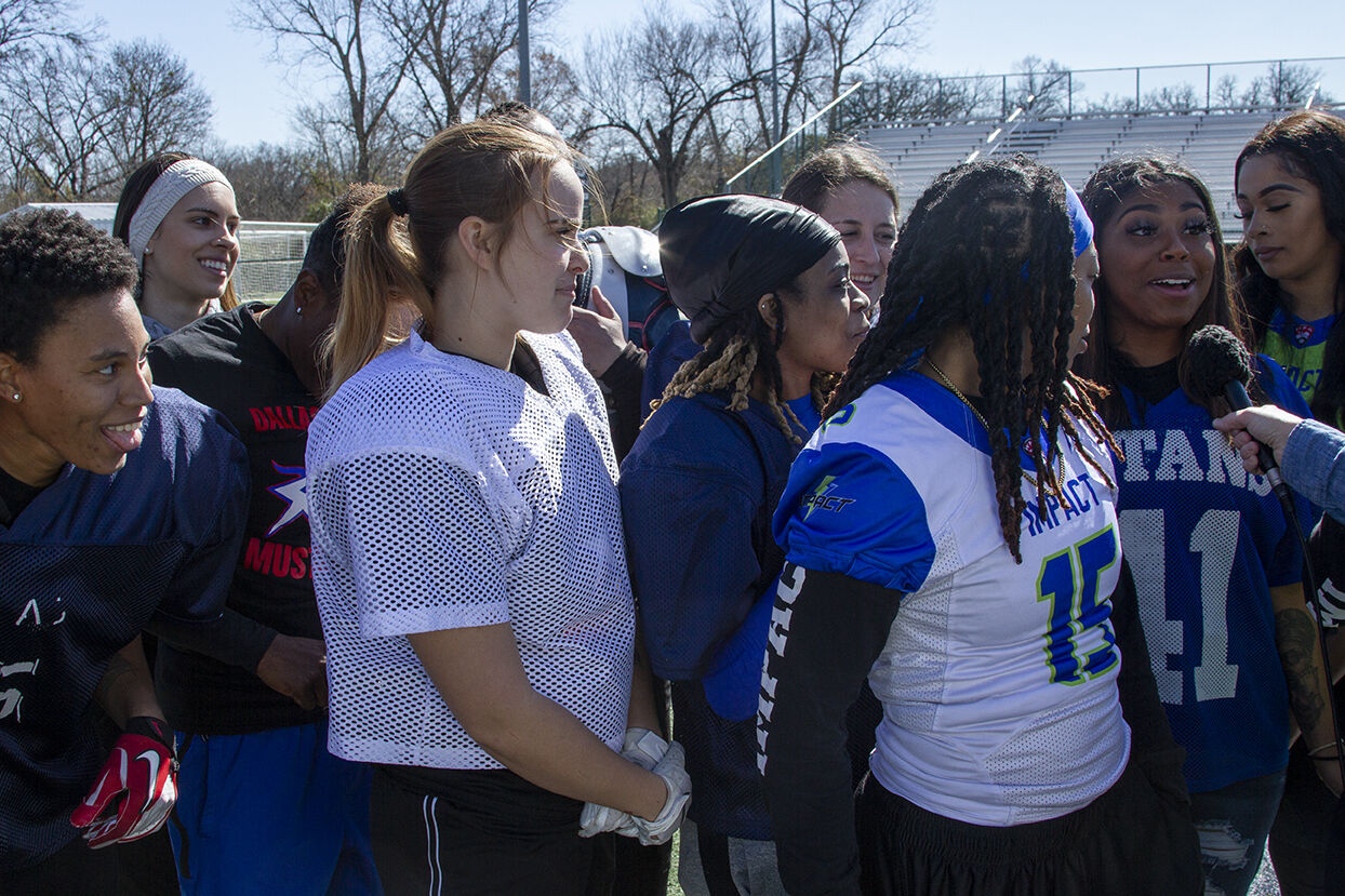 a group of young people in sports gear