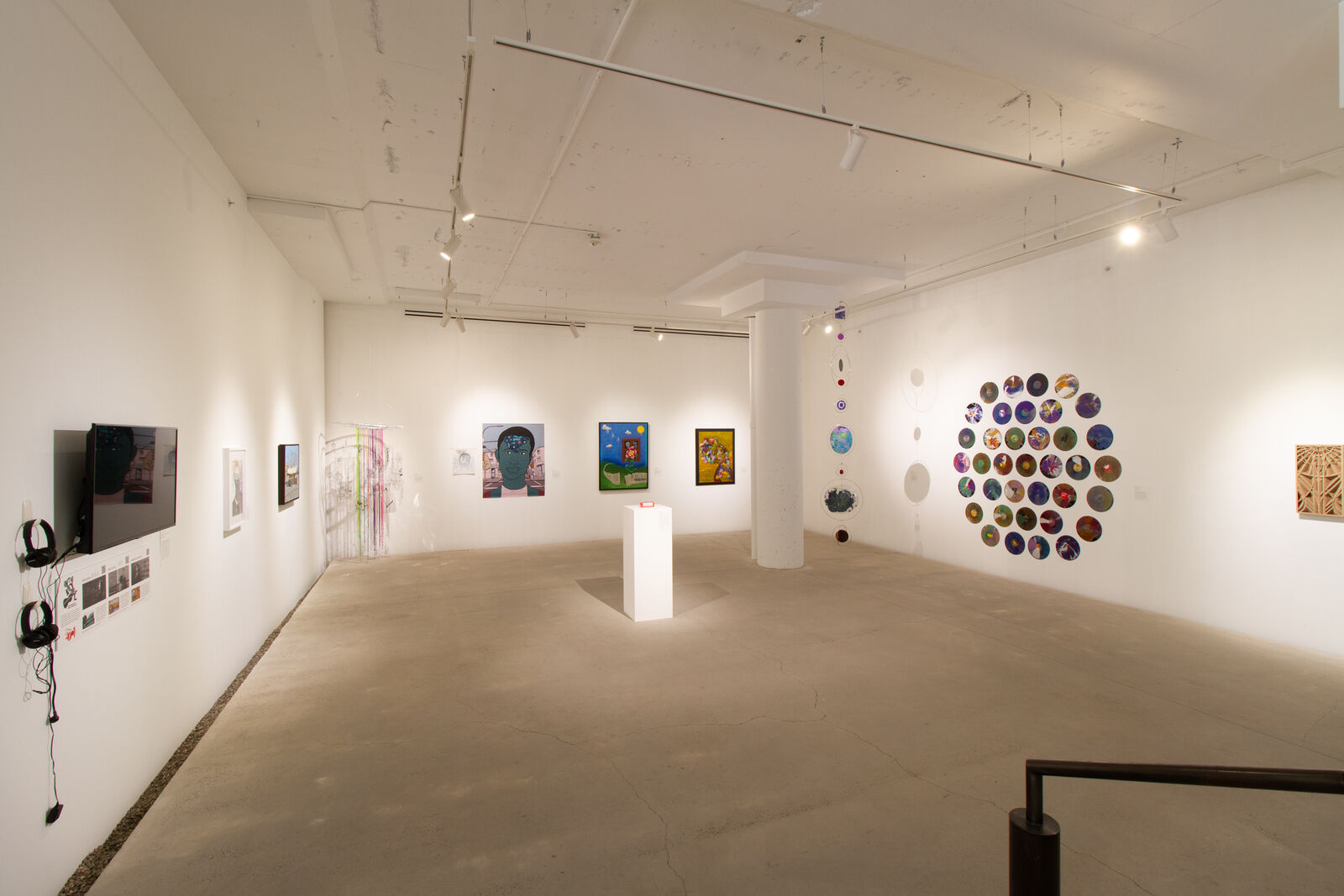 gallery with painting and diverse media installations